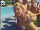 Hot chick flashing her tits at a college poolparty