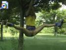 10 Points for originality: Teen ho flashes her pussy while hanging from a tree