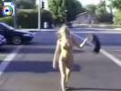 Very sexy blonde crosses the streets with no clothes on