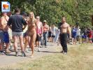 Girl walks around naked with tons of horny guys behind her