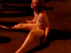 Wasted girl sitting nude in front of club