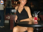 Cheeky girlfriend dropping her panties in bar