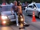 Horny car show slut humps guy on the hood
