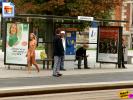 HOT skinny blonde chick walking by a bus stop with NO clothes on!
