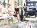 Slut shows her pussy and pisses on the street