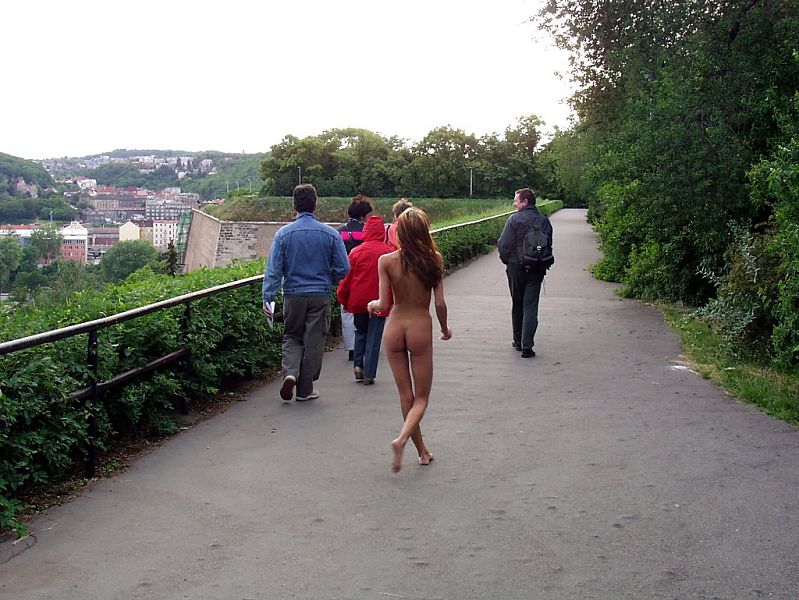 Petite teenage girl shows off her hot nude body in public