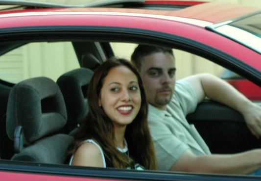 Horny amateur bitch in a car flashing tits and ass