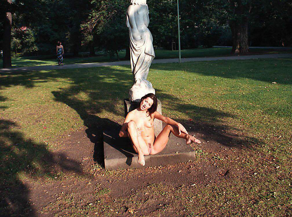 Very slutty toned girl shows off her body in the park