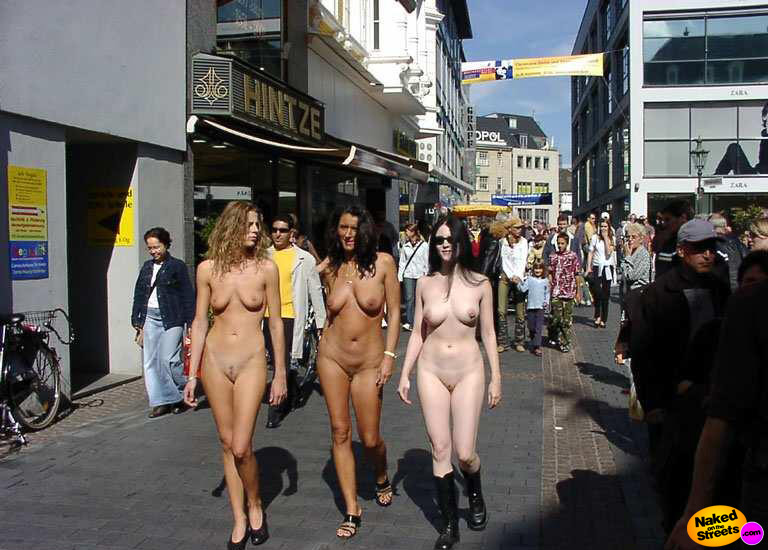 Three naughty girls walking naked on the streets