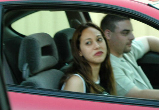 Horny amateur bitch in a car flashing tits and ass
