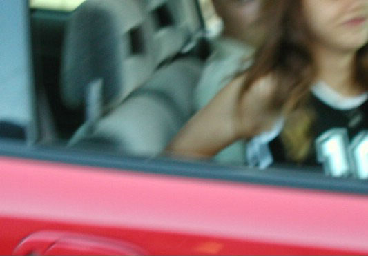 Horny amateur bitch in a car flashing tits and ass