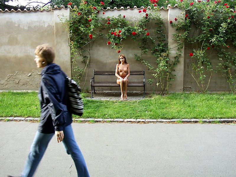 Petite teenage girl shows off her hot nude body in public