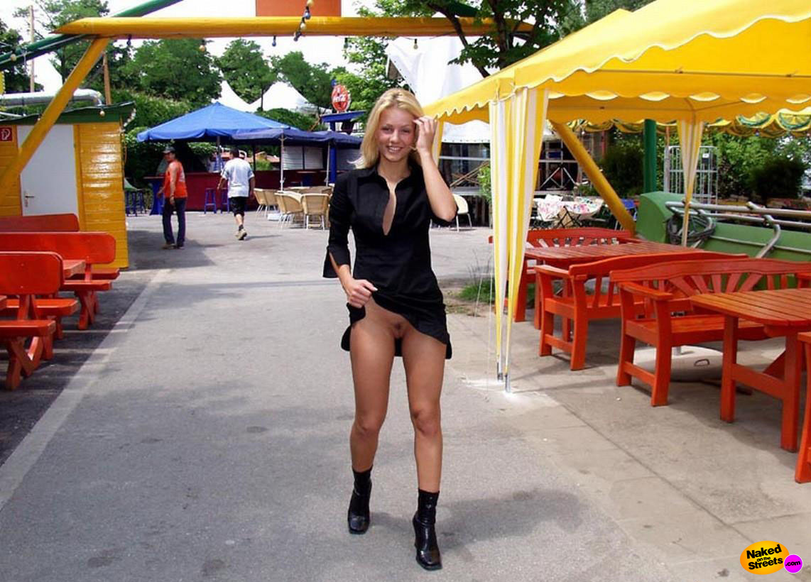 Hot blonde teen girl shows off her pussy in public