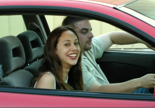 Horny amateur bitch in a car flashing tits and ass