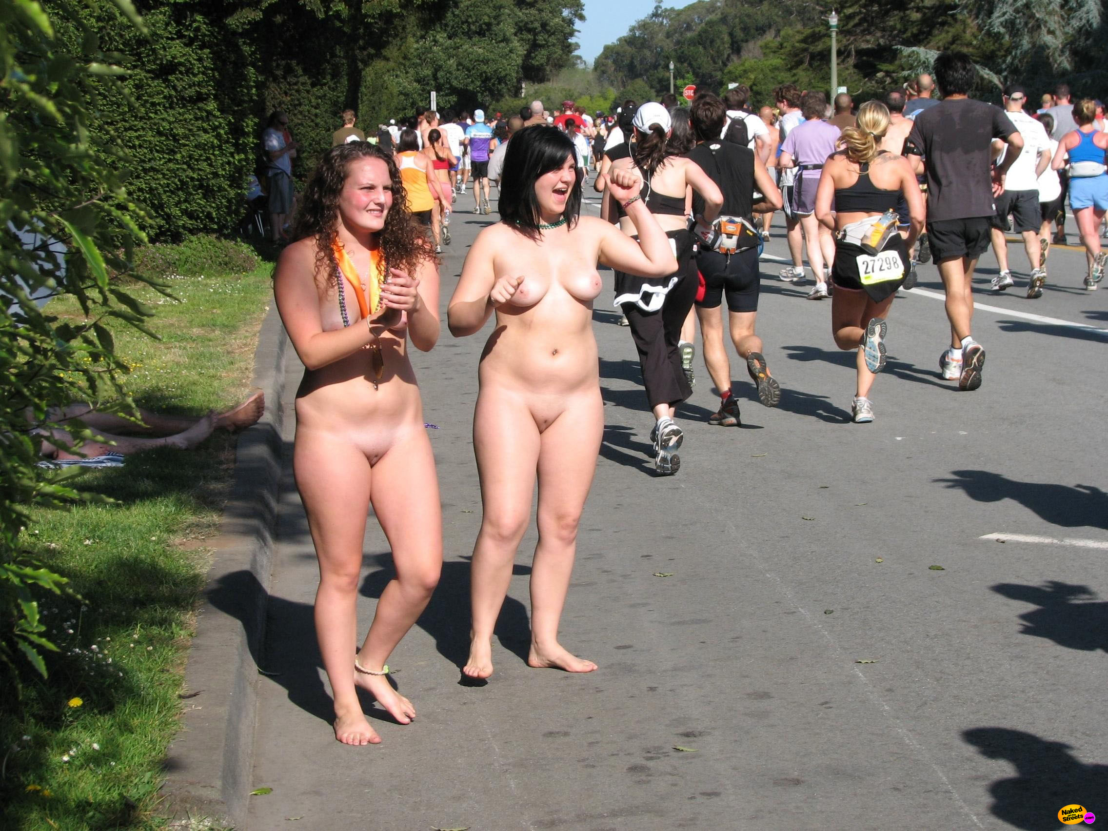 Two chubby naked teens cheer on marathon runners on a dare