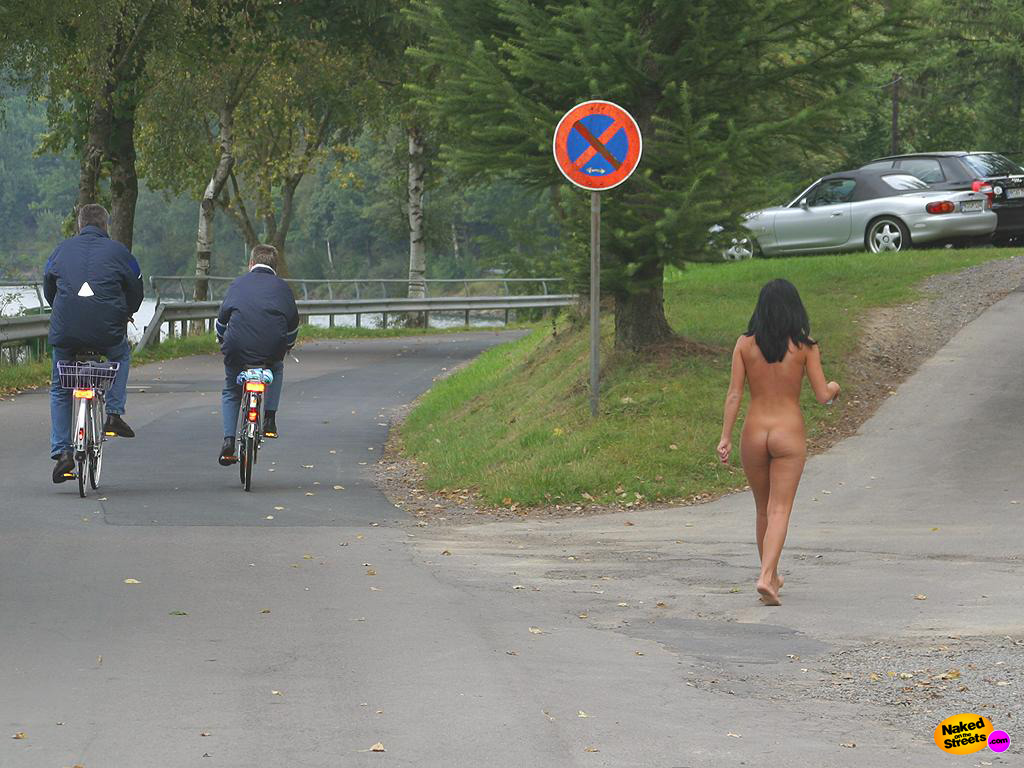 This girl walks around on the streets naked