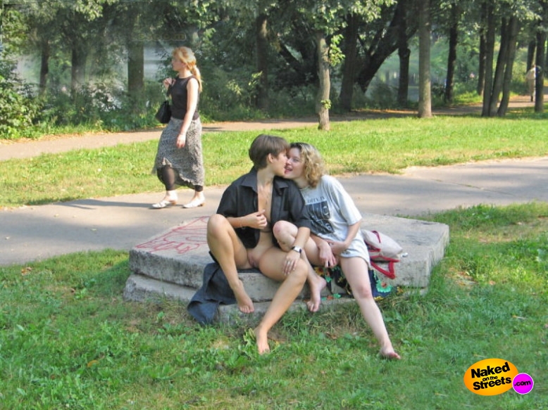 Lesbians playing with their pussies on a hot summer day