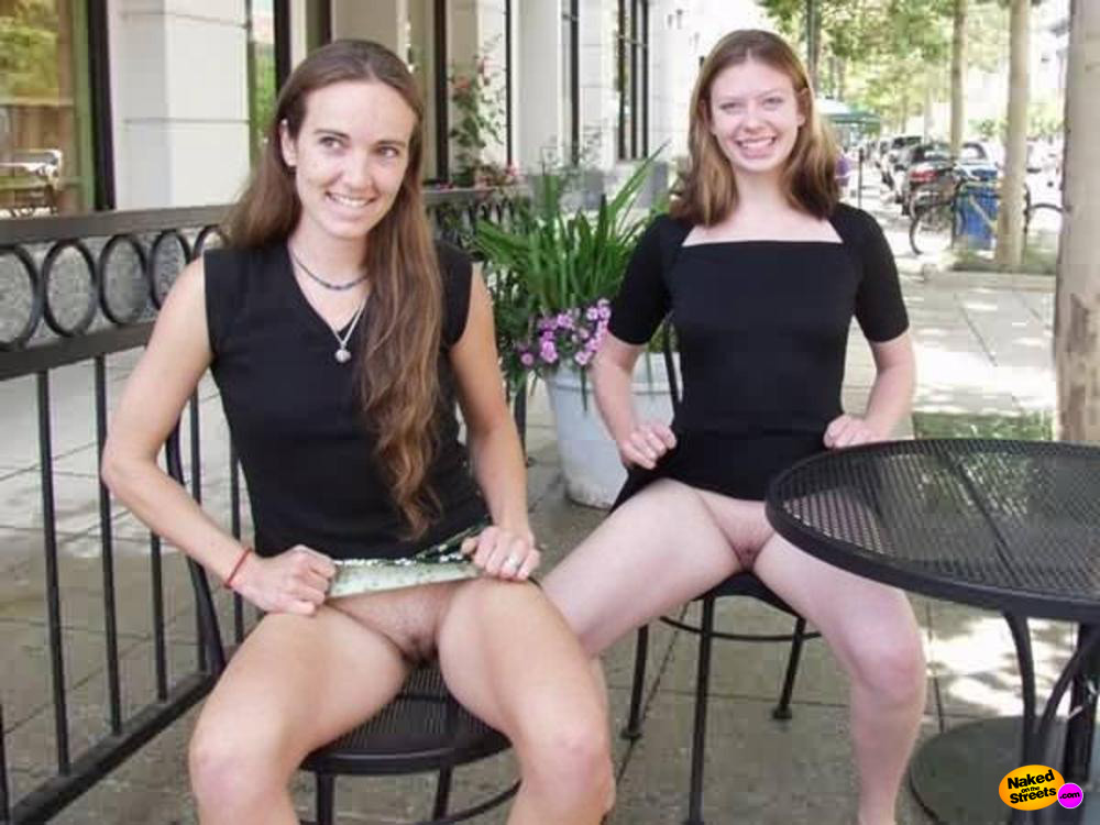 Two teen girls show their pussies in public