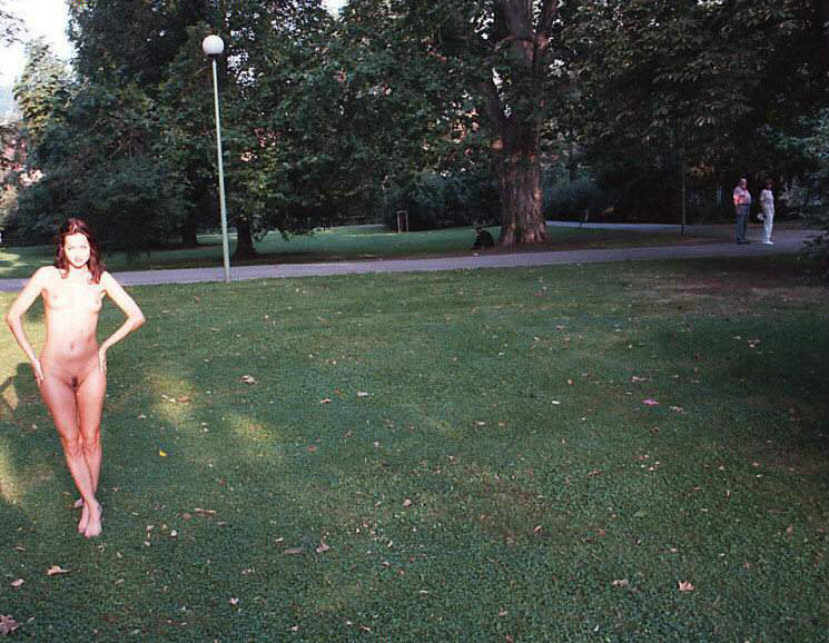 Very slutty toned girl shows off her body in the park
