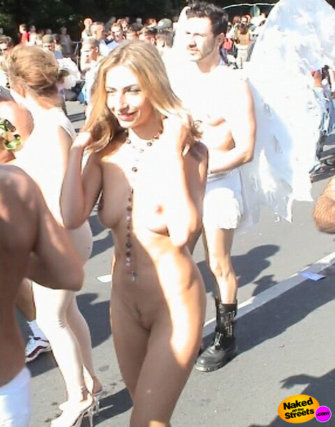 Crazy amateur sluts walks the streets fully nude at a nudism festival