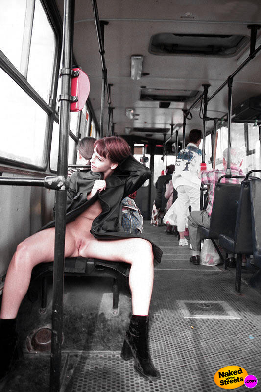 Crazy young teen flashing her bald pussy inside a train