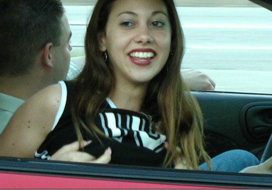 Horny amateur bitch in a car flashing tits and ass
