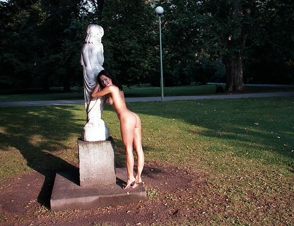 Very slutty toned girl shows off her body in the park