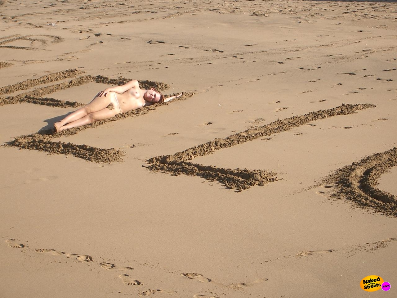 Nude beach relaxing