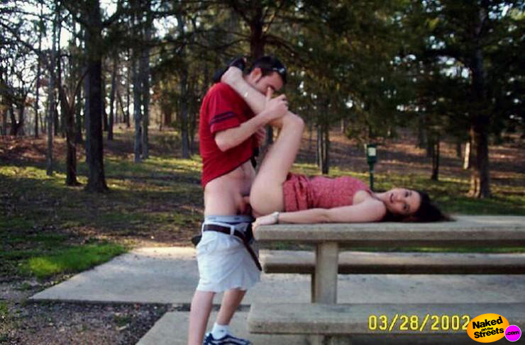 Horny slut gets fucked hard while lying on a picnic table