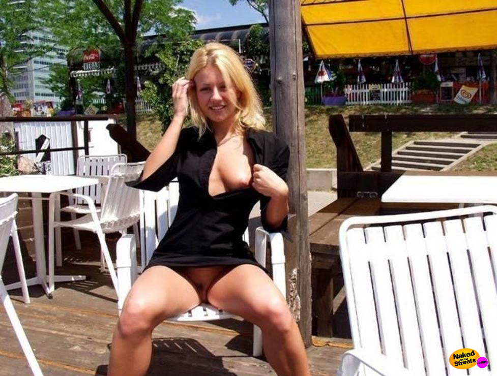 Hot blonde shows her goodies in public