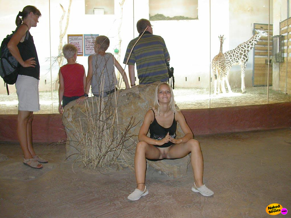 Naughty highschool girl shows her snatch in front of the giraffes