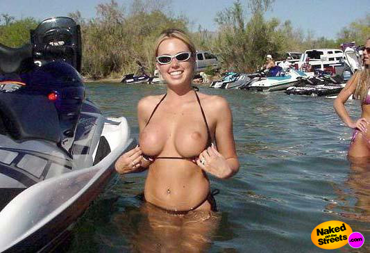 Super hot college chick flashing her big perfect titties at Spring Break