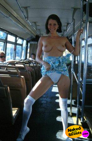 Hot body chick flashing her tits in the middle of a bus