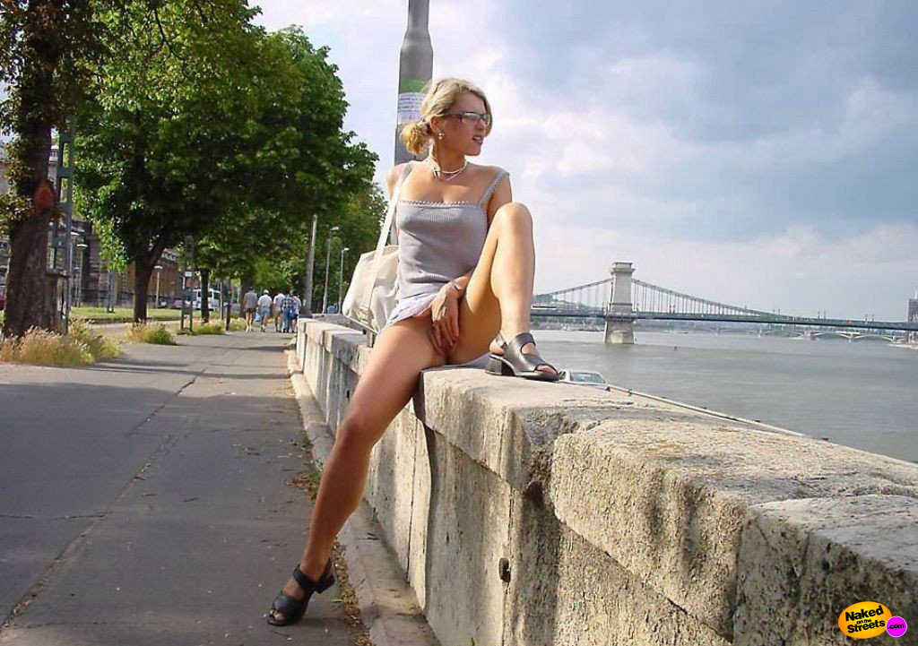 Blonde hottie shows off her snatch near the river