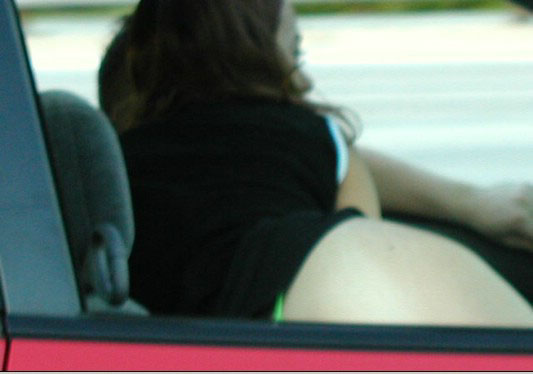 Horny amateur bitch in a car flashing tits and ass