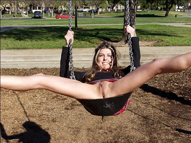 MILF takes off her underwear and spreads her pussy at the kids playground