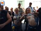 Two rather ugly chicks flashing their boobies at Mardi Gras! (Pictures)