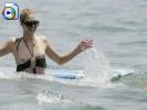 Oops! Paris shows her titties at the beach