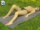 Sexy blonde slut sunbathing in the nude out in public