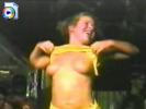 Crazy drunk slut dances like a power drill and flashes her small tits on stage