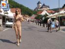 Skinny brunette teen walks around town fully naked (Galleries)