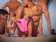 Women changing at the beach (Galleries)