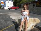 Redhead cutie shows her bits in the street (Galleries)