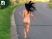 Naked girl runs through the street