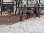 Naughty brunette has fun walking naked in the streets (Galleries)