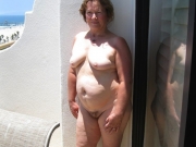 Fat mature flashing on balcony (Galleries)