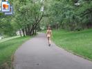 Red shoe hottie walks around naked in a park (Galleries)