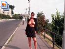 Big boobed amateur walks around with her titties out (Galleries)