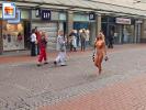 Crazy blonde slut walks through town wearing nothing at all (Galleries)