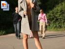 Thin chick in a nice coat flashing her goodies in the park  (Galleries)